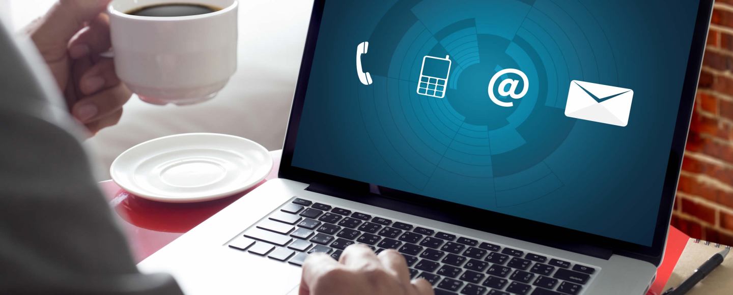 Man looking at web page with contact options